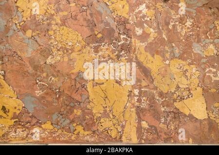 warm colored natural marble panel, natural beautiful marble in dark and warm colors, marble background texture, closeup Stock Photo