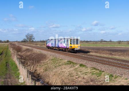 Northern rail class 144 pacer train 144021 passing Mauds Bridge Yorkshire with an all stations topping train Stock Photo