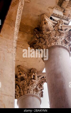 Corinthian order capitol is carved with two staggered rows of stylized acanthus leaves in Avignon, France. Stock Photo