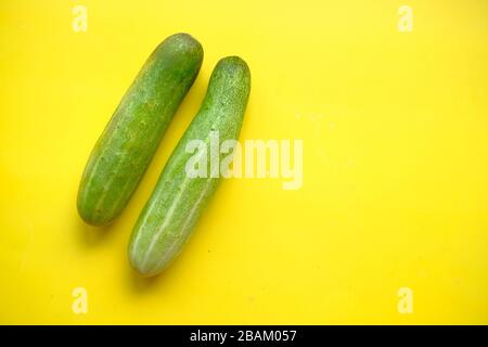Two cucumbers on an isolated white background Stock Photo