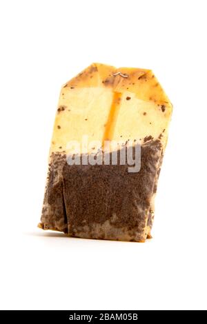 Used tea bag on a white background Stock Photo