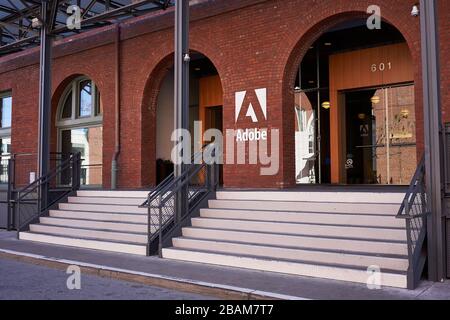 The entrance to American multinational computer software company Adobe Inc.'s San Francisco office. Stock Photo