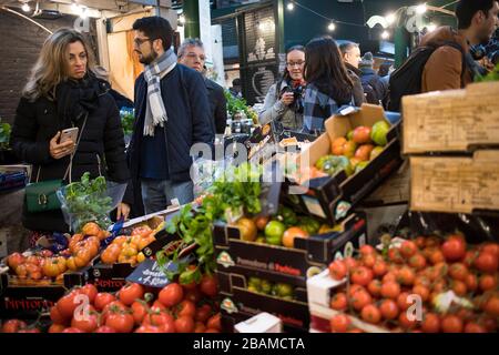 London, UK - 15 March 2020, People shop at Borough Market in Southwark, London. It is one of oldest markets in Europe. Its 1,000th birthday was in 201 Stock Photo