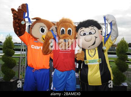 Winners of the Football League Mascot Race, in support of Prostate Cancer UK. Winner from York City FC  Yorkie the Lion (centre), 2nd place Burton Albion FC's Billy Brewer(right) and 3rd place Oldham Athletic AFC's Chaddy Owl (left) Stock Photo