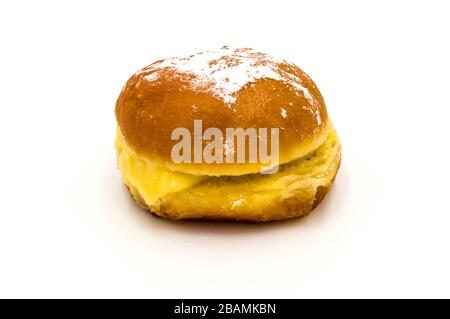 Bola de Berlim, or Berlim Ball, a Portuguese pastry made from a fried donut filled with sweet eggy cream and rolled in crunchy sugar on a white backgr Stock Photo