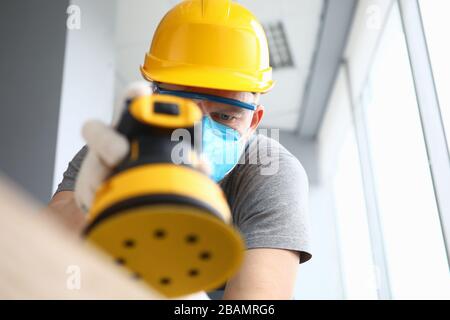 Concentrated man in face mask Stock Photo