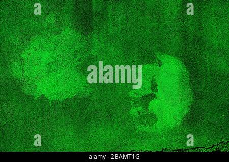 Green colored abstract wall background with textures of different shades of green Stock Photo