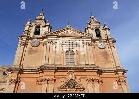 The facade of St. Paul's Cathedral, a landmark Catholic church in Mdina, Malta. Founded in the 12th century, it was rebuilt between 1696 and 1705. Stock Photo