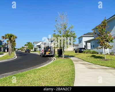 Orlando, FL/USA-1/28/20:  A United States Postal Service, USPS, Truck making deliveries in the suburban area of Laureate Park, Lake Nona in Orlando, F Stock Photo