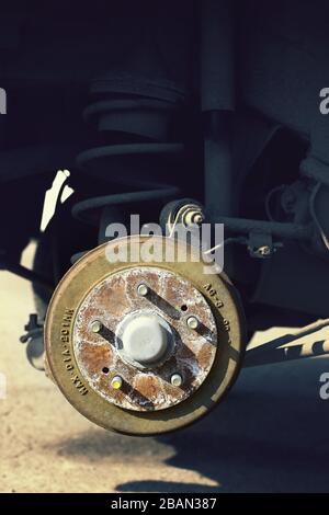 Car brake drum with stopping support without wheels closeup vertical Stock Photo