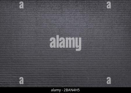 Black cardboard close up. Large texture and background Stock Photo