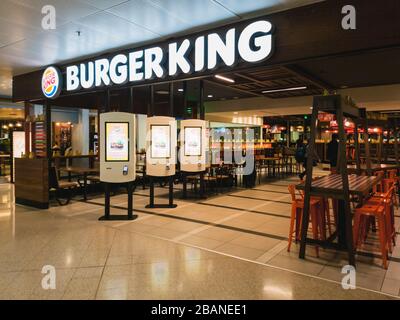 Athens, Greece - February, 11 2020: An empty Burger King restaurant inside the departure hall of Athens International Airport Eleftherios Venizelos Stock Photo