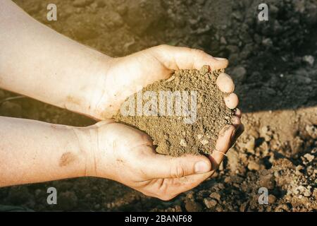 A close up view on soil in mans palms Stock Photo
