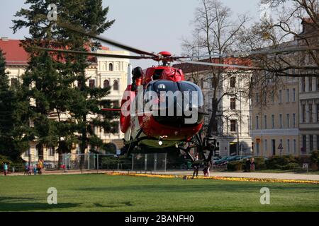 goerlitz GERMANY - march 28 2020: DRF Luftrettung (German Air Rescue) D-HDSW helicopter landing at Wilhelmsplatz. Notarzt means emergency doctor. Stock Photo