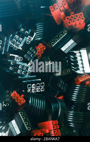 A close up view on a computer wires parts background vertical Stock Photo