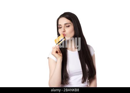 Black haired young woman with a credit card Stock Photo