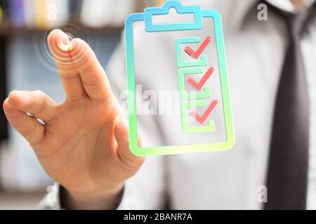 A Touching Check List on Visual Screen Stock Photo