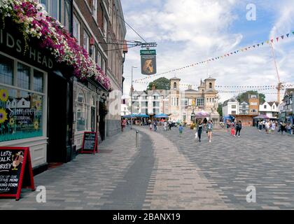 Looking up Church Street to Kingston's Ancient Market Place, in operation since 1242.  Kingston Upon Thames, Surrey, Borough of London, England. Stock Photo