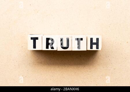 Letter block in word truth on wood background Stock Photo