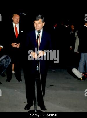 Chicago,  Illinois, USA, September 4,  1988 Democratic Presidential candidate Governor of Massachusetts Michael Dukakis speaking upon arrive at O’Hare airport. Neil Hartigan (Red Tie) is behind him Credit: Mark Reinstein/MediaPunch Stock Photo