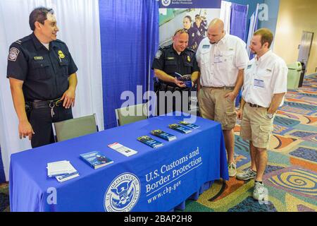 Miami Beach Florida,Miami Beach Convention Center,Miami International Boat Show,exhibitor,US Customs & Border Protection,officer,uniform,man men male Stock Photo