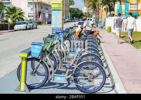 Miami Beach Florida,DecoBike Citi Bike CitiBike,rental bicycles,bicycle,bicycling,riding,biking,rider,stand,FL110331004 Stock Photo