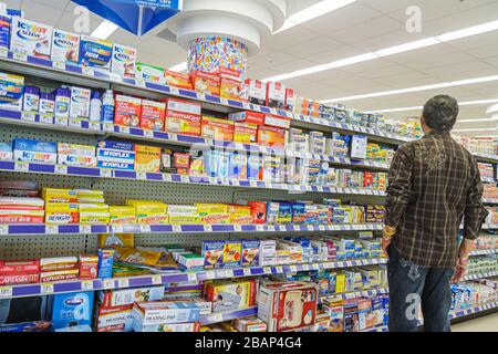 Miami Beach Florida,Walgreens,pharmacy,drugstore,shelf shelves,display sale,brands,sore muscles,man men male adult adults,shopping shopper shoppers sh Stock Photo