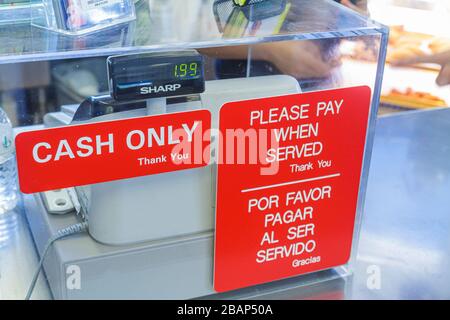 Miami Beach Florida,Sixth 6th Street,Las Olas Cafe Cuban cafeteria restaurant,sign cash only Spanish English language,bilingual please pay when served Stock Photo