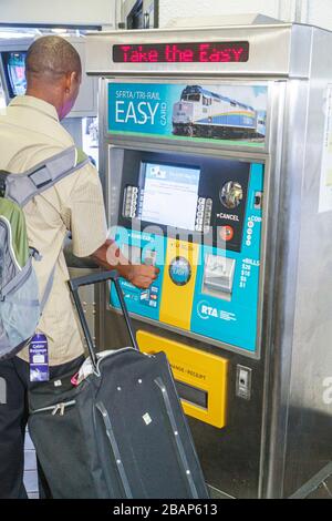 Miami Florida International Airport MIA,Miami Dade Metrobus stop,station,Tri Rail Easy Card,train,vending machine,ticket,FL110919005 Stock Photo