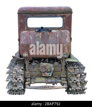 Rusty  vintage abandoned   small rural  no name tractor back side view. The metal equipment is made more than sixty years ago. Mass production. Isolat Stock Photo