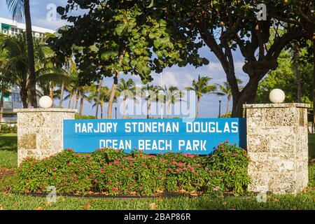 Miami Beach Florida,Ocean Drive,Marjory Stoneman Douglas Ocean water Beach Park,sign,logo,front,entrance,visitors travel traveling tour tourist touris Stock Photo