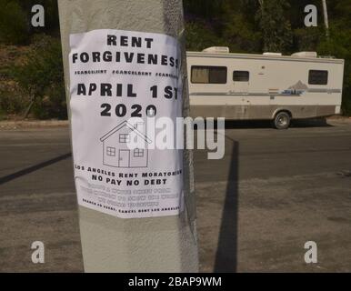 Los Angeles, USA. 29th Mar, 2020. A sign calls for a rent moratorium near a self-testing coronavirus site in Los Angeles on Saturday, March 3, 2020. Photo by Jim Ruymen/UPI Credit: UPI/Alamy Live News Stock Photo
