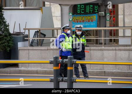 Policemen wearing protective masks during the Coronavirus pandemic, Seoul, South Korea Stock Photo