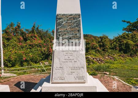 Plaque at the Monument to Unity and Friendship at the border between the French and Dutch sides of the Caribbean island of St. Martin / St. Maarten Stock Photo