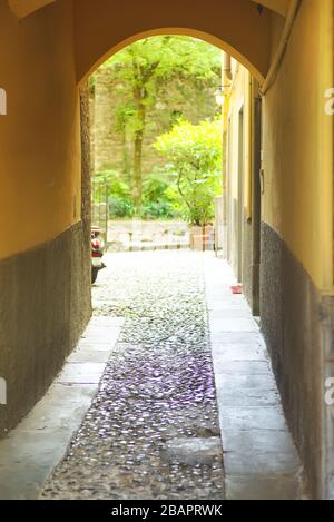 the narrow street in old city of Bergamo, Italy Stock Photo