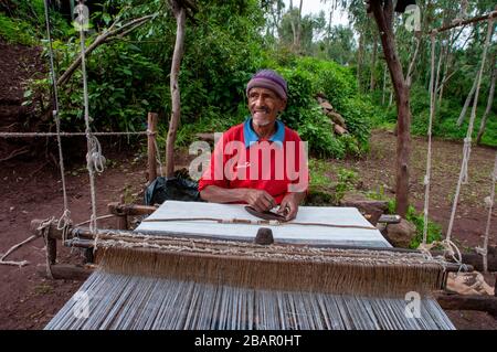Man sewing, Lalibela, Ethiopia Stock Photo