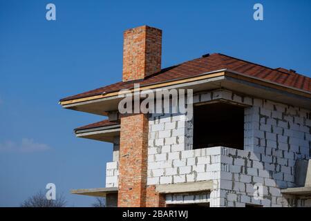 construction of a country two-story house from a gas block Stock Photo