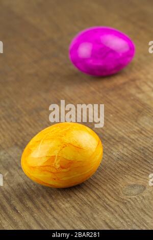 colorful easter eggs on a wooden board Stock Photo