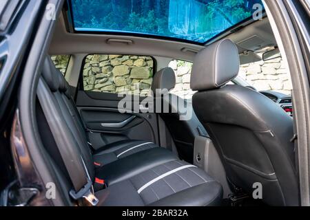 Inside detailed photo of wonderful SUV with panoramic glazed dach/sunroof