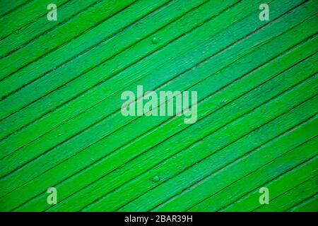 The texture of the old green board located diagonally. Stock Photo