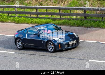 A Nissan 350Z [Fairlady Z Z33”] sports car travelling along the Stock ...