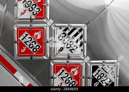 DOT Placards Displayed on the Rear of a Fuel Tanker Stock Photo