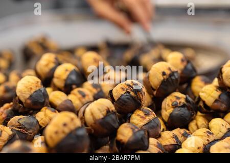 Closeup of street food of roasted chestnuts in Turkey Stock Photo