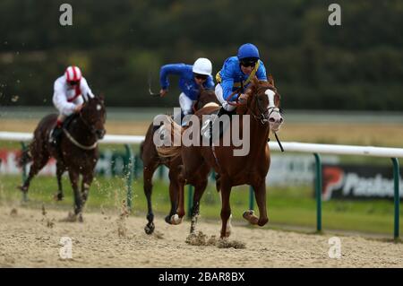 Correspondent ridden by jockey Eddie Ahern wins the Natwest Irish Stallion Farms E.B.F. Maiden Stakes on the All Weather Track at Lingfield Park Racecourse Stock Photo