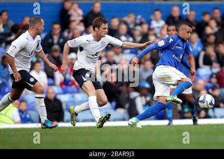 Birmingham City's Ravel Morrison (right) plays the ball away from Leicester city's Andy King (centre) and Daniel Drinkwater (left) Stock Photo