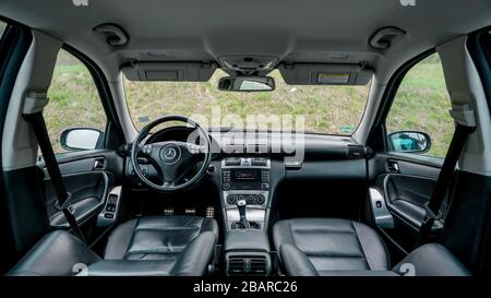 Mercedes Benz W203-year 2004, Avantgarde equipment;luxury leather interior, heated seats buttons, headrest controls, cruise control, dashboard-C Class Stock Photo
