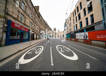 Edinburgh, Scotland, UK. 29 March, 2020. Life in Edinburgh on the first Sunday of the Coronavirus lockdown. Streets deserted, shops and restaurants closed, very little traffic on streets and reduced public transport. Pictured; Leith Walk. Iain Masterton/Alamy Live News Stock Photo