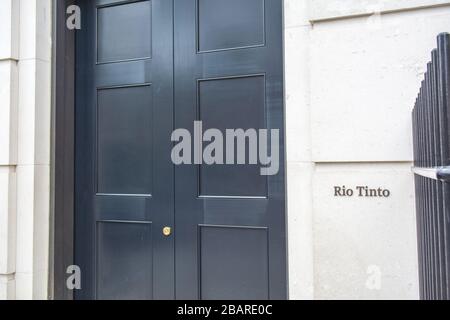 LONDON- Signage logo at the entrance of the Rio Tinto head office on St James's Square- a leading British global mining group Stock Photo