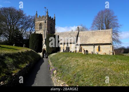 General view of the Parish Church of St Peter in the village of Upper Slaughter in the Cotswolds, Gloucestershire as the clocks move forward an hour to British Summer Time (BST). PA Photo. Picture date: Sunday March 29, 2020. Photo credit should read: David Davies/PA Wire Stock Photo