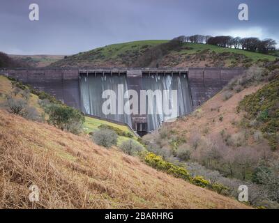 Water spilling over Meldon Dam on the West Okement River, Meldon Reservoir, Dartmoor National Park, Devon Stock Photo